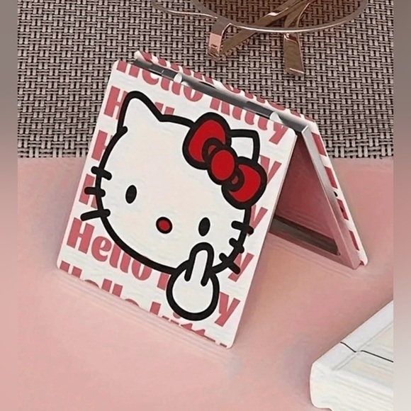 ✨ New ✨Hello Kitty Middle Finger Compact Mirror ✨ - Picture 1 of 3
